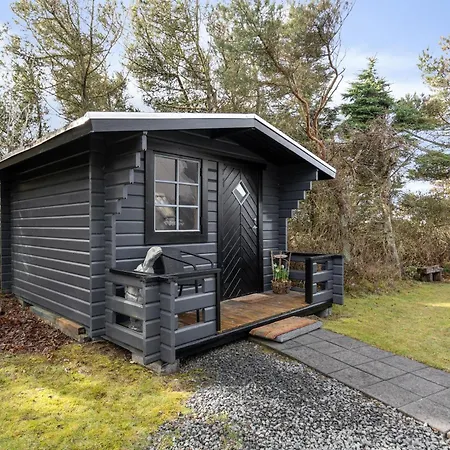 Holiday home Coxy Overlooking The Golf Course At Sondervig - 1019